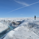 A meltwater stream runs through Greenland’s Russell Glacier.